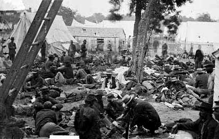 Union Army of the Potomac soldiers are treated in a field hospital at Savage Station